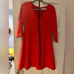 TRINA TURK  Red V neck dress. Says size 2. But fits like a size 6. 3/4 sleeve.